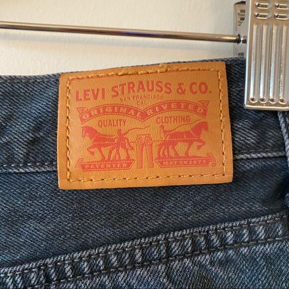 Levi’s-Ribcage Mini Skirt in a Washed Black with Raw Hem - Picture 12 of 13